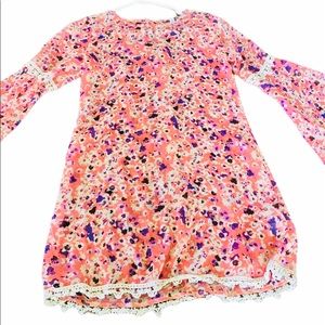 A girls pink and purple dress.